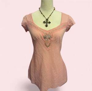 Pink babydoll top with beaded rhinestone